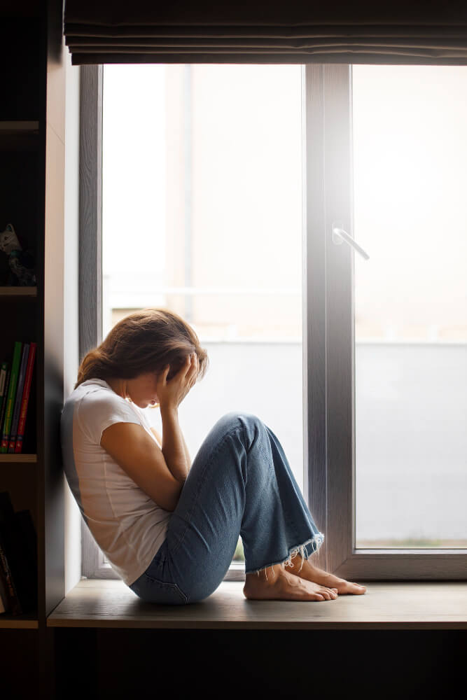 Kobieta cierpiąca na zaburzenia psychosomatyczne
